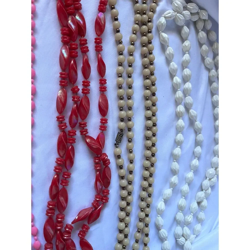 Lot of 4 plastic 1970's Vintage Long Necklaces